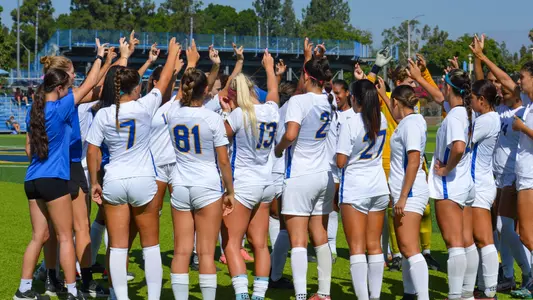 Women's Soccer team huddle