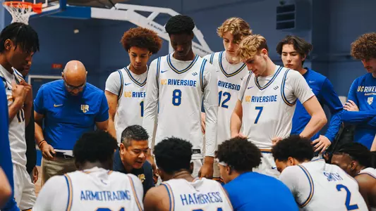 Men's Basketball Team Huddle