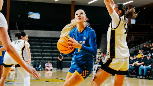 Hannah Wickstrom drives the lane at Idaho