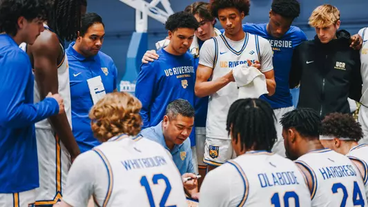 Men's Basketball Team Huddle