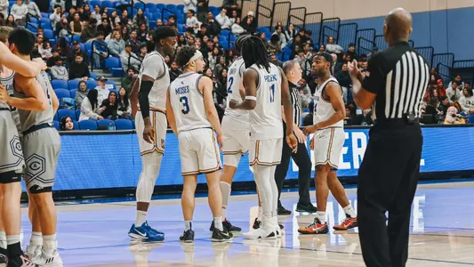 Men's Basketball Team Huddle
