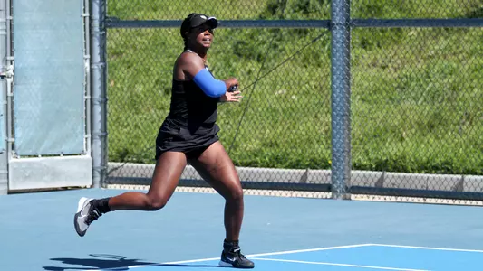 Olivia in singles competition vs Cal Poly