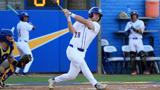Tyson Reis at bat at the Plex