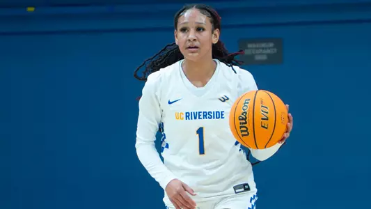 Kaylani Polk dribbles the basketball