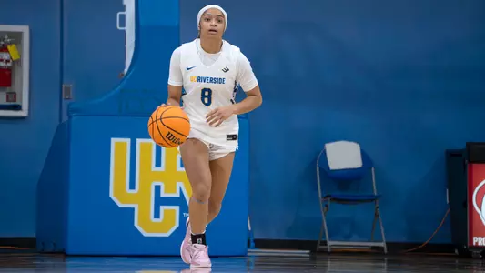Aaliyah Stanton brings the ball up the court