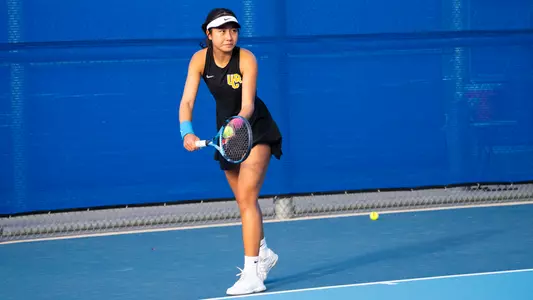 Camile Li serves