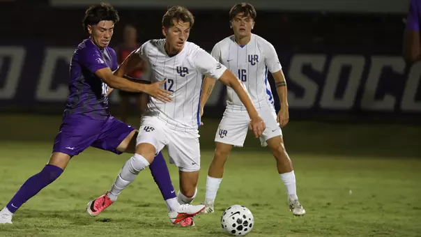 Brady Elliott holds off defenders at GCU