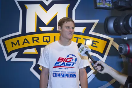 Senior Eric Pothast talks to media at the Al McGuire Center following the NCAA's announcement Monday