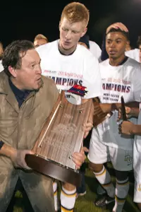 Head coach Louis Bennett and the Golden Eagles captured the BIG EAST Blue Division championship in 2011