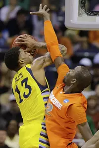 Vander Blue led Marquette with 14 points in a tough loss to Syracuse.