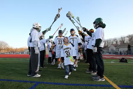 Jakub West (No. 38) leads the Golden Eagles onto the field vs. Detroit on April 20, 2013.