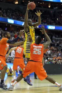 Chris Otule and MU will open against CS Fullerton at The Wooden Legacy.