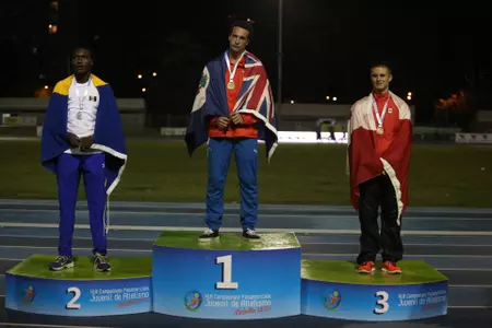 Krzyszkowski on the medal stand in Colombia (photo courtesy of Liga De Atletismo De-Antioquia).