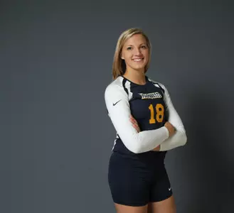 Elizabeth Koberstein embodies Marquette's four pillars of faith, excellence, leadership and service.