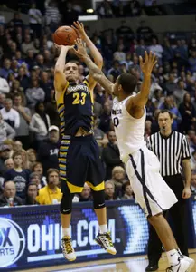 Jake Thomas knocked down five treys at Xavier Thursday night.