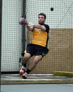 Bret Hardin won the weight throw at Milwaukee.