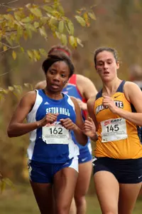 Alison Parker (pictured) will compete in the women's championship race along with her freshmen twin sisters Jennifer and Jessica.