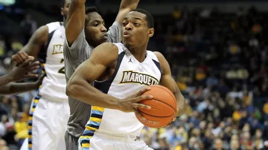 John Dawson appeared in 25 career games with Marrquette.