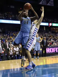 Forward Davante Gardner shoots over DePaul's Sandi Marcius