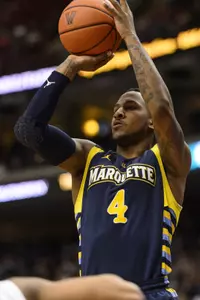 Marquette Golden Eagles guard Todd Mayo (4) shoots a jump shot during the first half against the Villanova Wildcats at the Wells Fargo Center. Mandatory Credit: Howard Smith-USA TODAY Sports