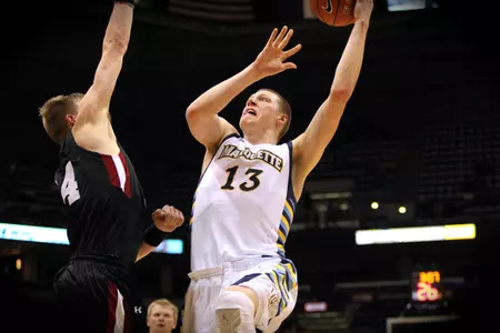 Freshman Henry Ellenson posted 21 and 16 in his NCAA debut against a veteran-laden Belmont squad.