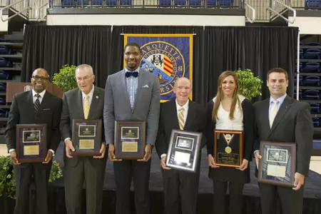 Three recipients of 2014's athletic alumni awards