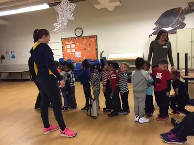 Tate Pashibin volunteering with some of the children at SEDA.