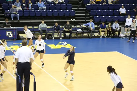 Lauren Houg leads the league in digs per set