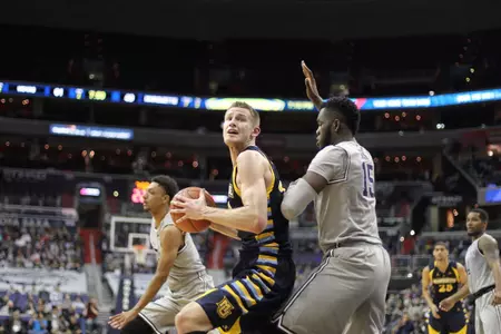 Luke Fischer finished with 10 points, 9 rebounds for Marquette.
