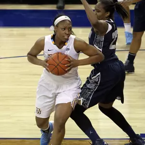 Erika Davenport is pulling down 6.6 rebounds per game