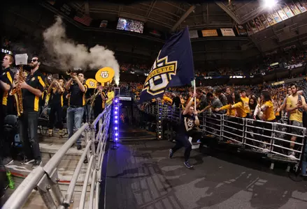 Marquette Men's Basketball vs. Villanova on National Marquette Day; wide angle; flag; student sectio