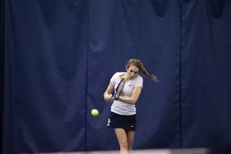 Erin Gebes earned a doubles and singles victory today
