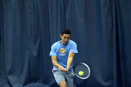 Senior Daniel Fernandez clinched the doubles point and team win.