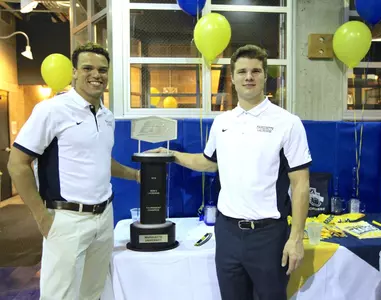 Senior Phil McFarland with the BIG EAST Championship trophy.
