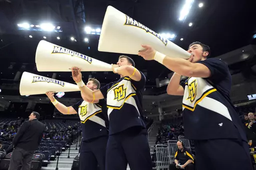 Mar 5, 2018; Chicago, IL, USA; Marquette Golden Eagles cheerleaders yell during the second half against the Creighton Bluejays of a semifinal game in the women's Big East Conference tournament at the Wintrust Arena. The Golden Eagles won 76-70 to advance to the championship game. Mandatory Credit: Patrick Gorski-USA TODAY Sport
