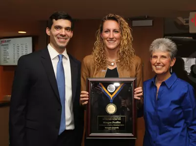 Morgan Proffitt (center), who was given her McCahill Award in January, will be honored again on April 27.