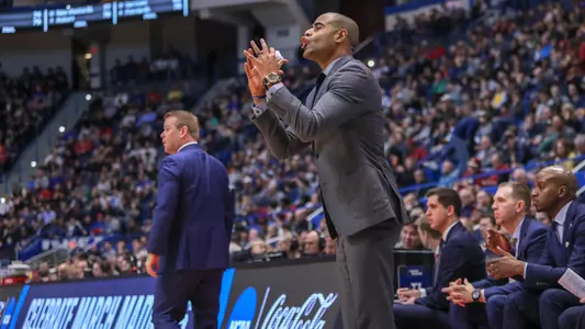Stan Johnson on the bench in the 2019 NCAA Basketball Tournament