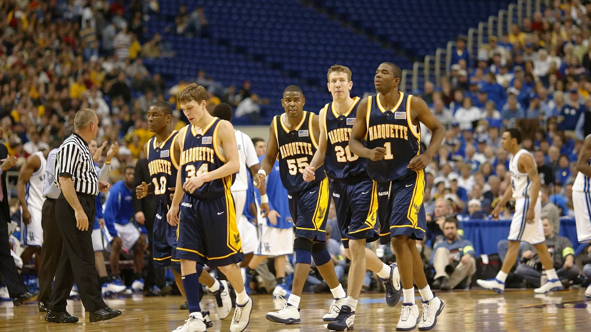 Men's basketball game action against Kentucky in the Elite Eight, 2003
Athletes, Karon Bradley, Males, Men's Basketball, Robert Jackson, Steve Novak, Students, Todd Townsend, Travis Diener
Men's basketball game action against Kentucky in the NCAA Elite Eight, March 29, 2003.