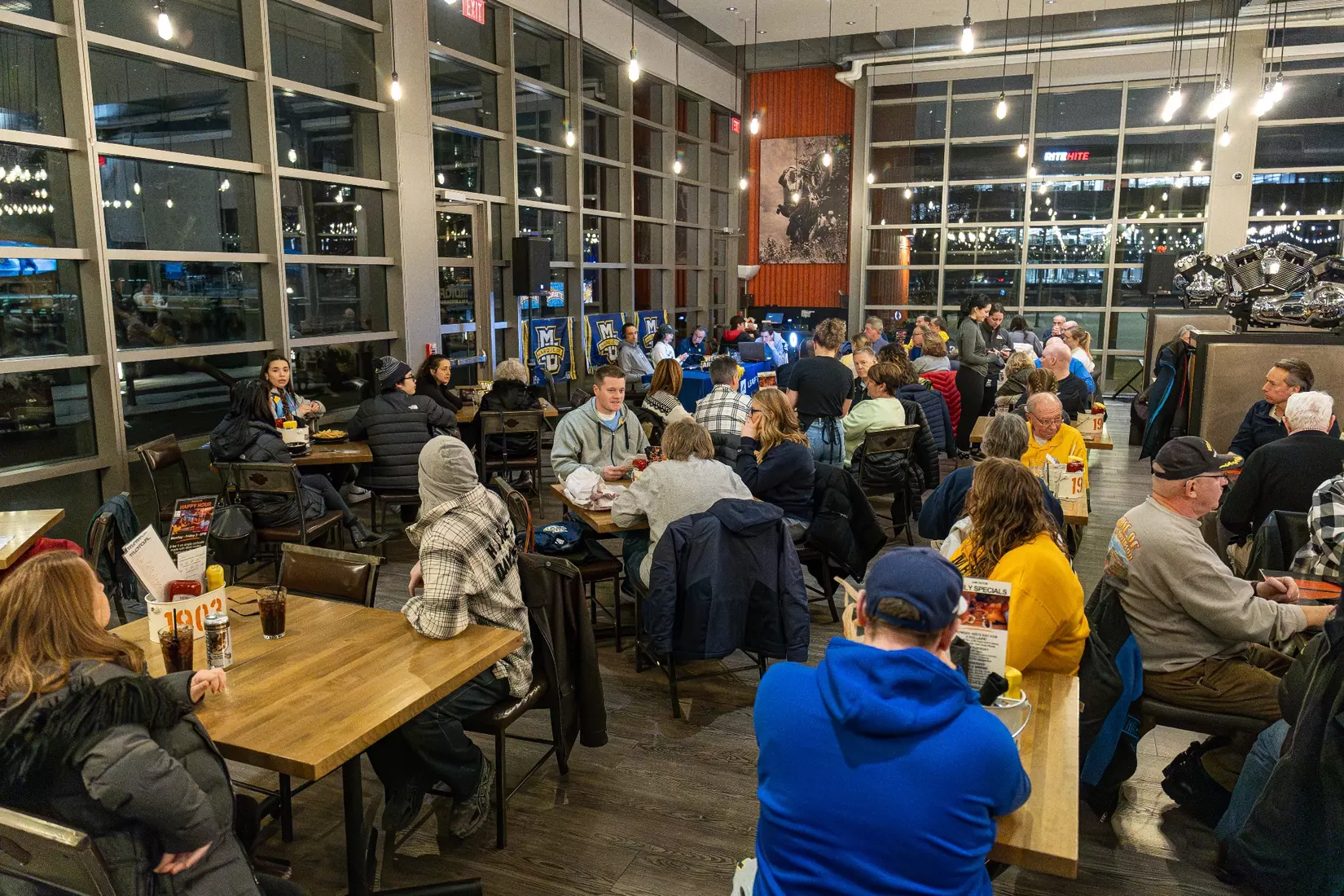 Marquette Basketball head coach Shaka Smart and No . 4 Stevie Mitchell appear on ESPN Milwaukee's radio show at Motor Bar & Restaurant at the Harley Davidson Museum on Thursday January 11, 2024 in Milwaukee, WI.