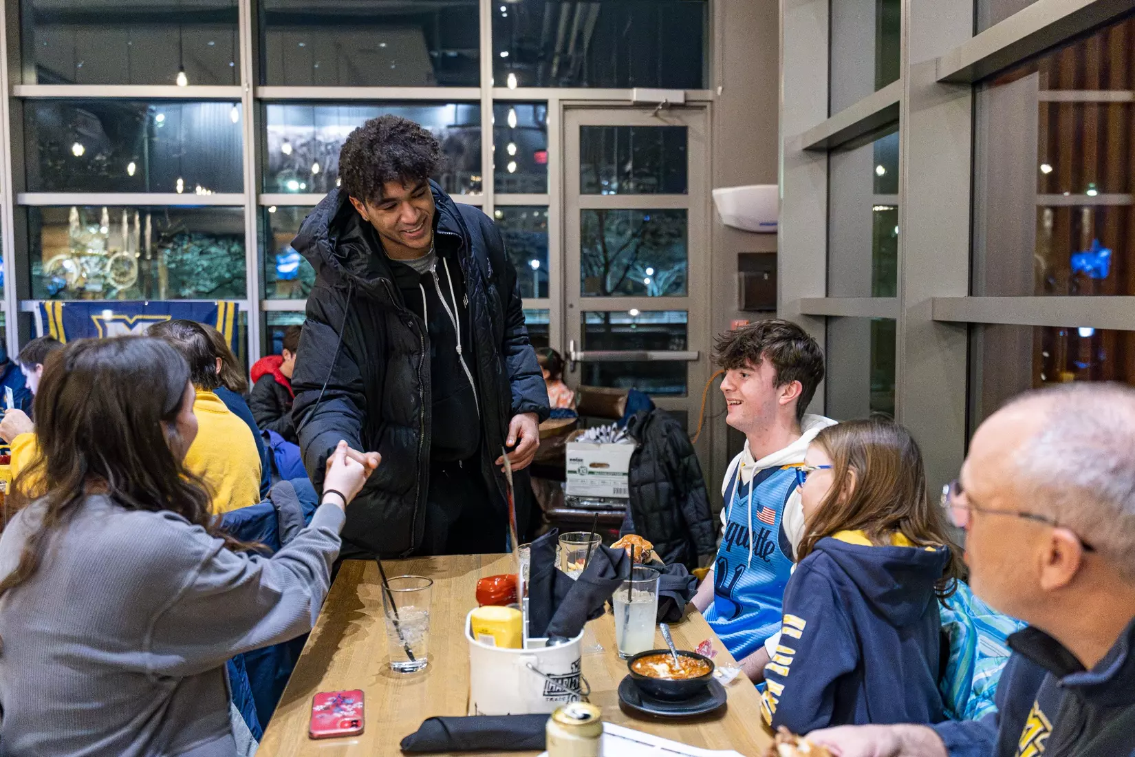Marquette Basketball head coach Shaka Smart and No . 4 Stevie Mitchell appear on ESPN Milwaukee's radio show at Motor Bar & Restaurant at the Harley Davidson Museum on Thursday January 11, 2024 in Milwaukee, WI.