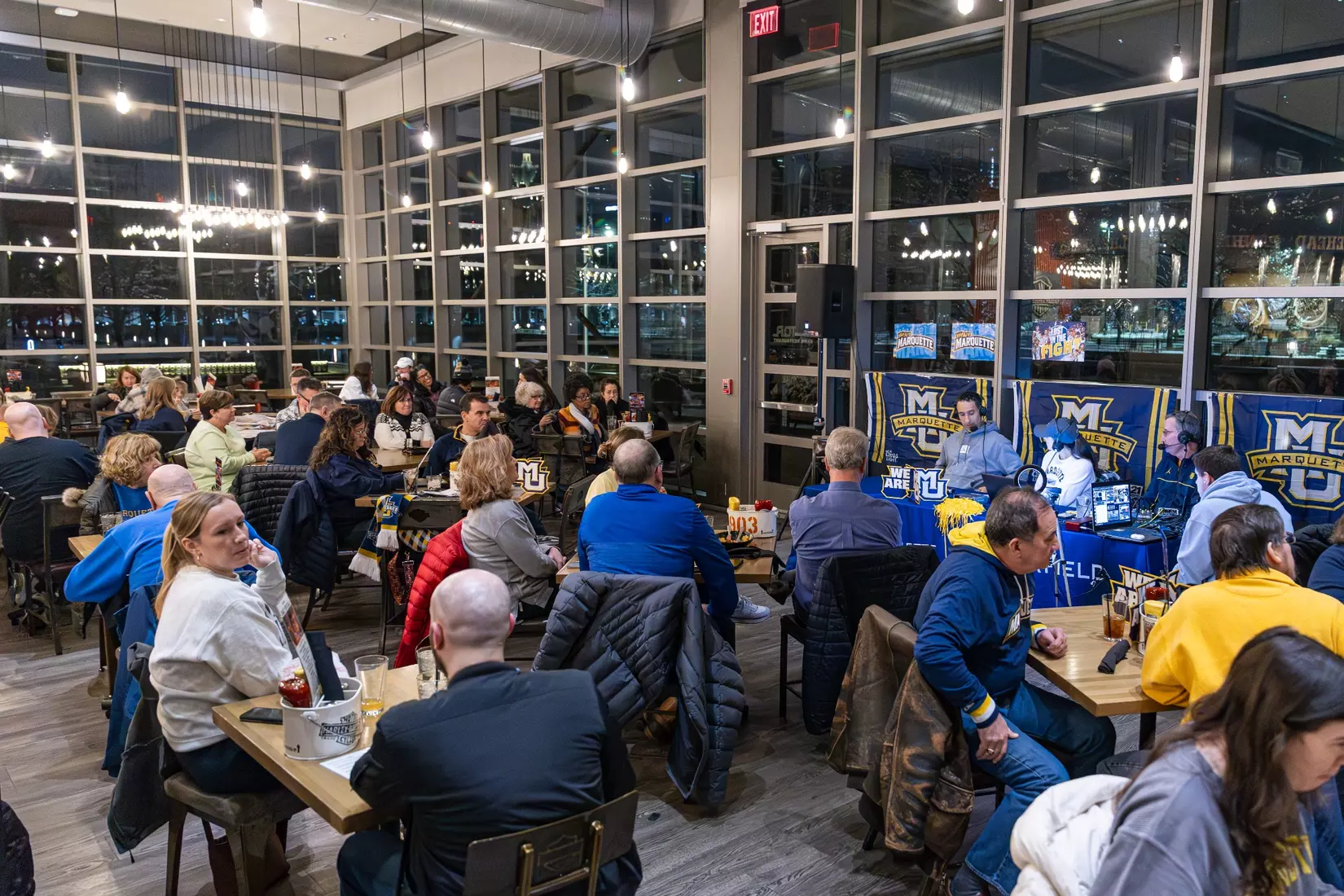 Marquette Basketball head coach Shaka Smart and No . 4 Stevie Mitchell appear on ESPN Milwaukee's radio show at Motor Bar & Restaurant at the Harley Davidson Museum on Thursday January 11, 2024 in Milwaukee, WI.