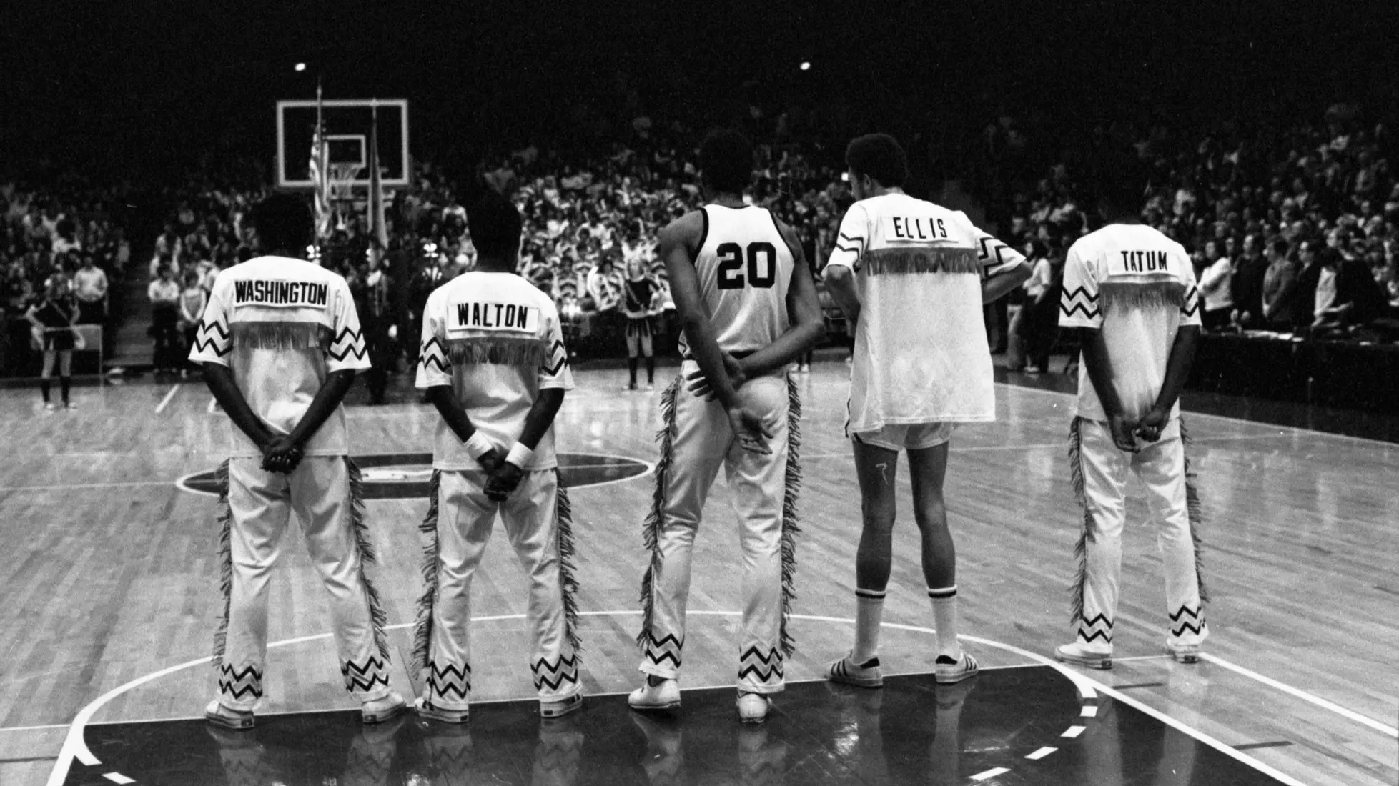 Marquette players line up during the National Anthem before a basketball game on December 1, 1973
Men's Basketball, Athletes, Marcus Washington, Lloyd Walton, Maurice Lucas, Bo Ellis, Earl Tatum