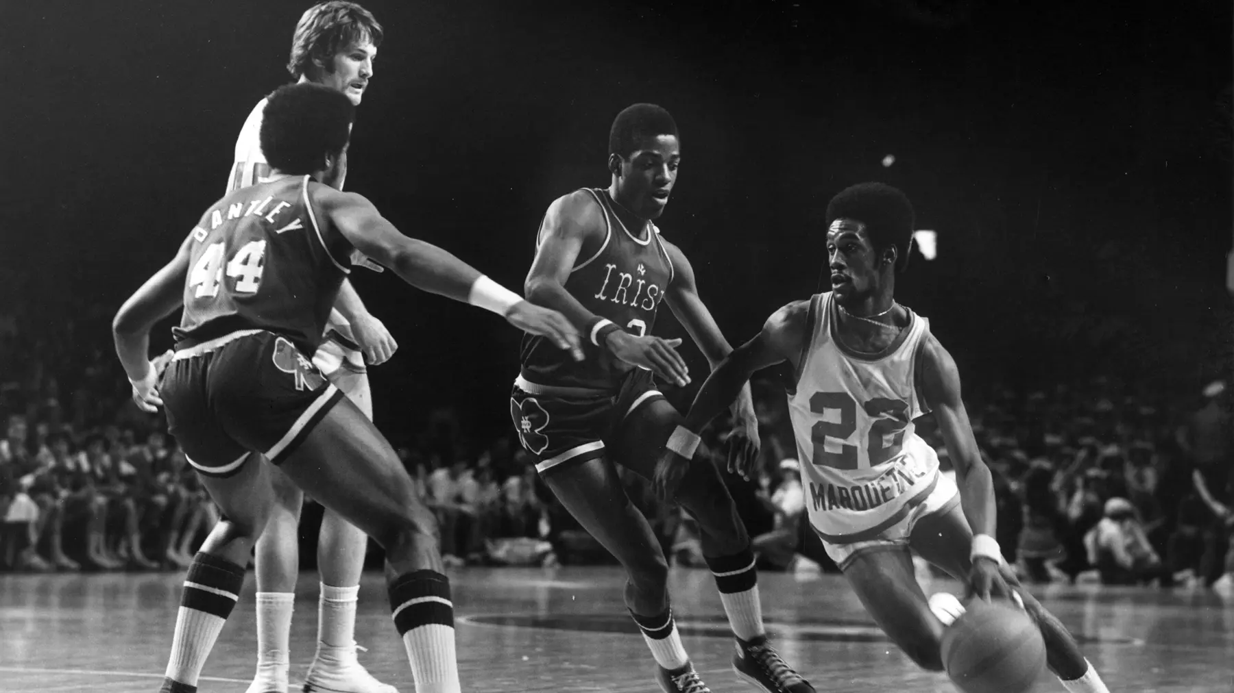 Marquette basketball player Lloyd Walton dribbles the basketball around an opponent from Notre Dame, circa 1975
Lloyd Walton dribbles the basketball, circa 1975
Lloyd Walton, Athletes, Males, Men's Basketball