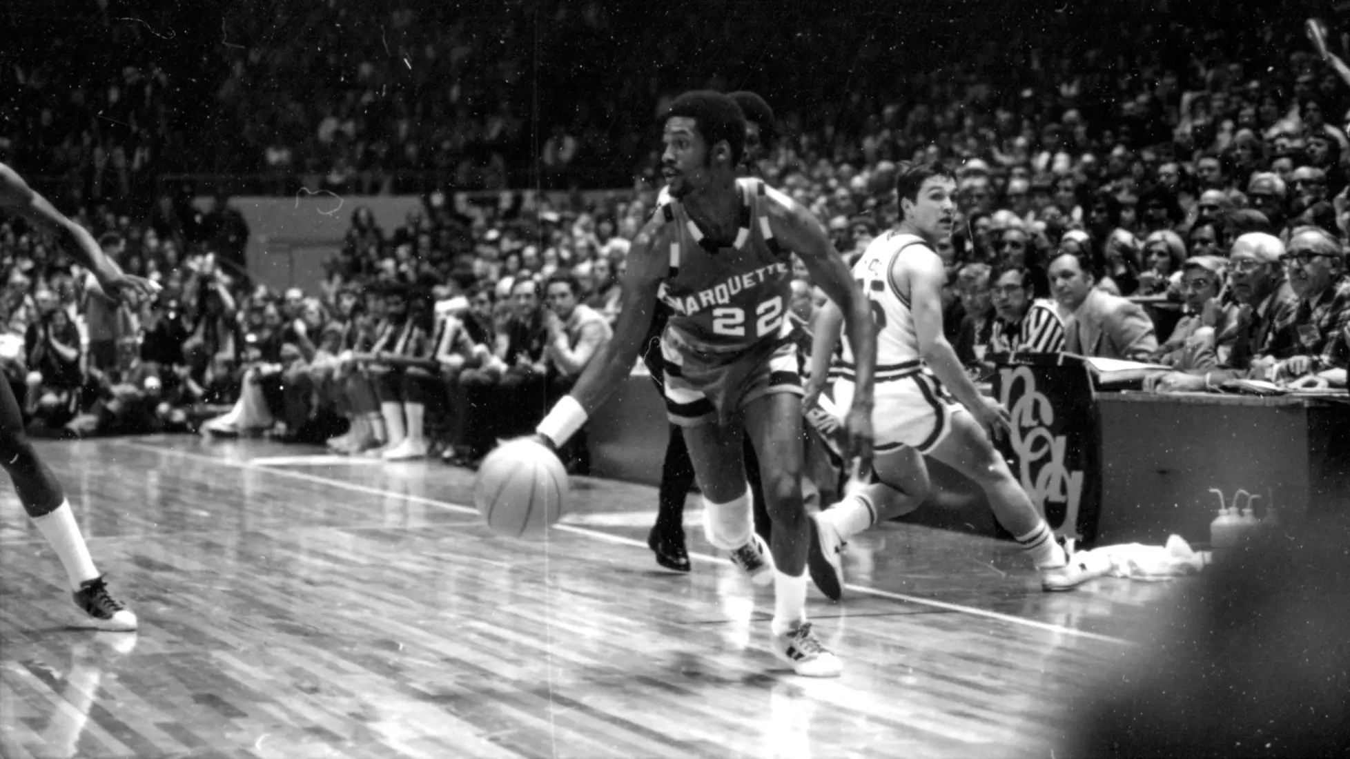Lloyd Walton dribbles the ball in the NCAA Championship game against North Carolina State, March 25, 1974.
Lloyd Walton, Men's Basketball, Athletes, Males