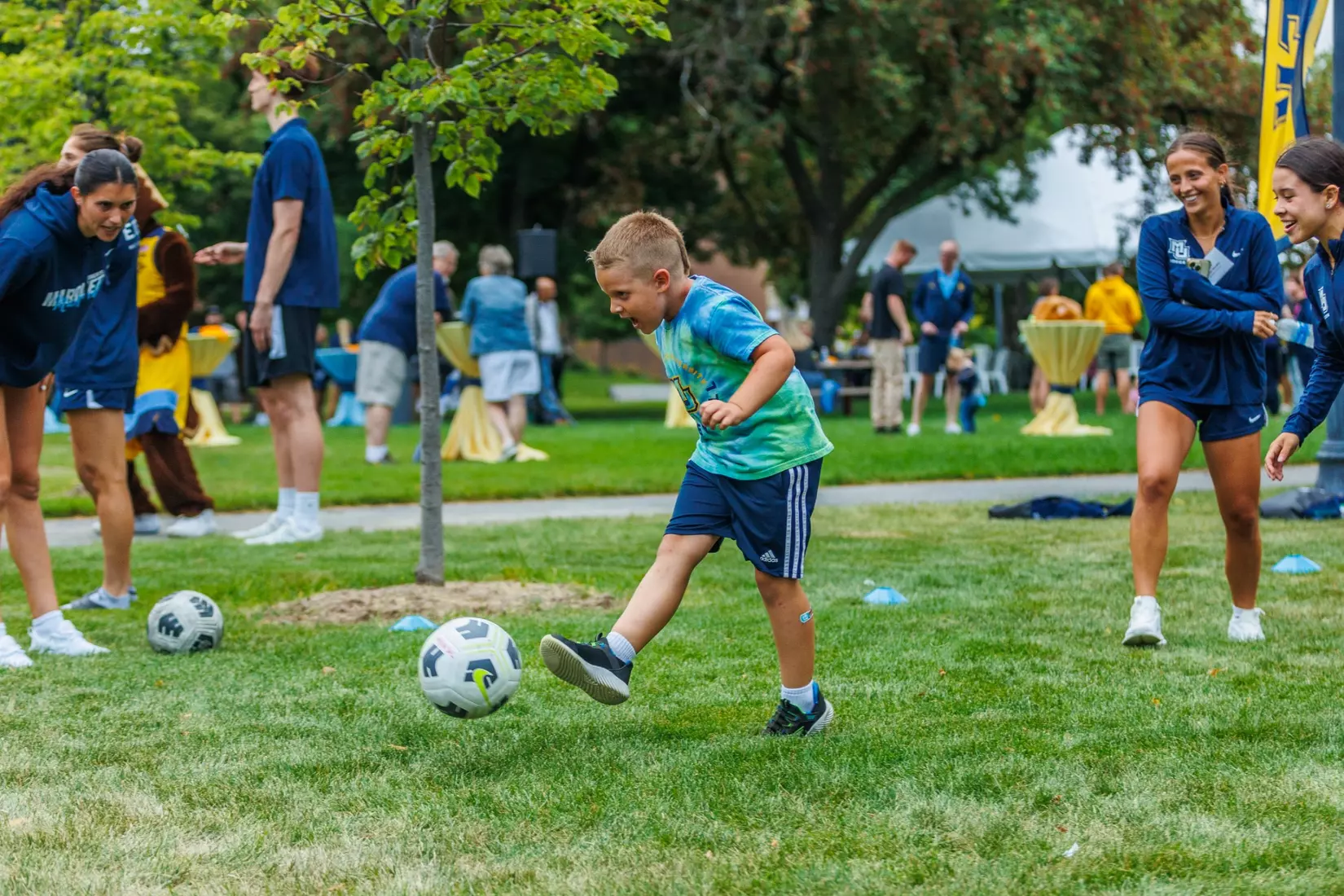 Marquette Athletics Block Party is held in the Central Mall on the campus of Marquette University on Wednesday, August 28, 2024 in Milwaukee, Wisconsin.