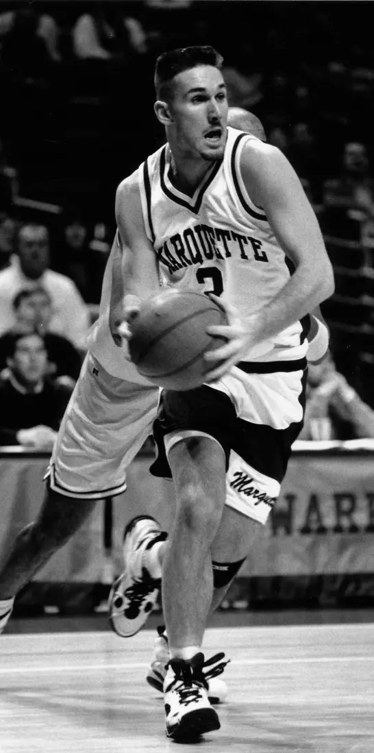 Marquette basketball player Anthony Pieper drives to the basket, 1993-1997