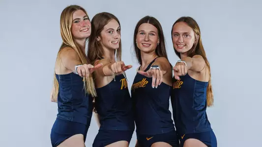 Allison Opalka, Brynn Miller, Kaylie Earl, Taya Gummerson
Marquette Cross Country poses for media day pictures in the Al McGuire Center in Milwaukee, WI on August 21st, 2025.