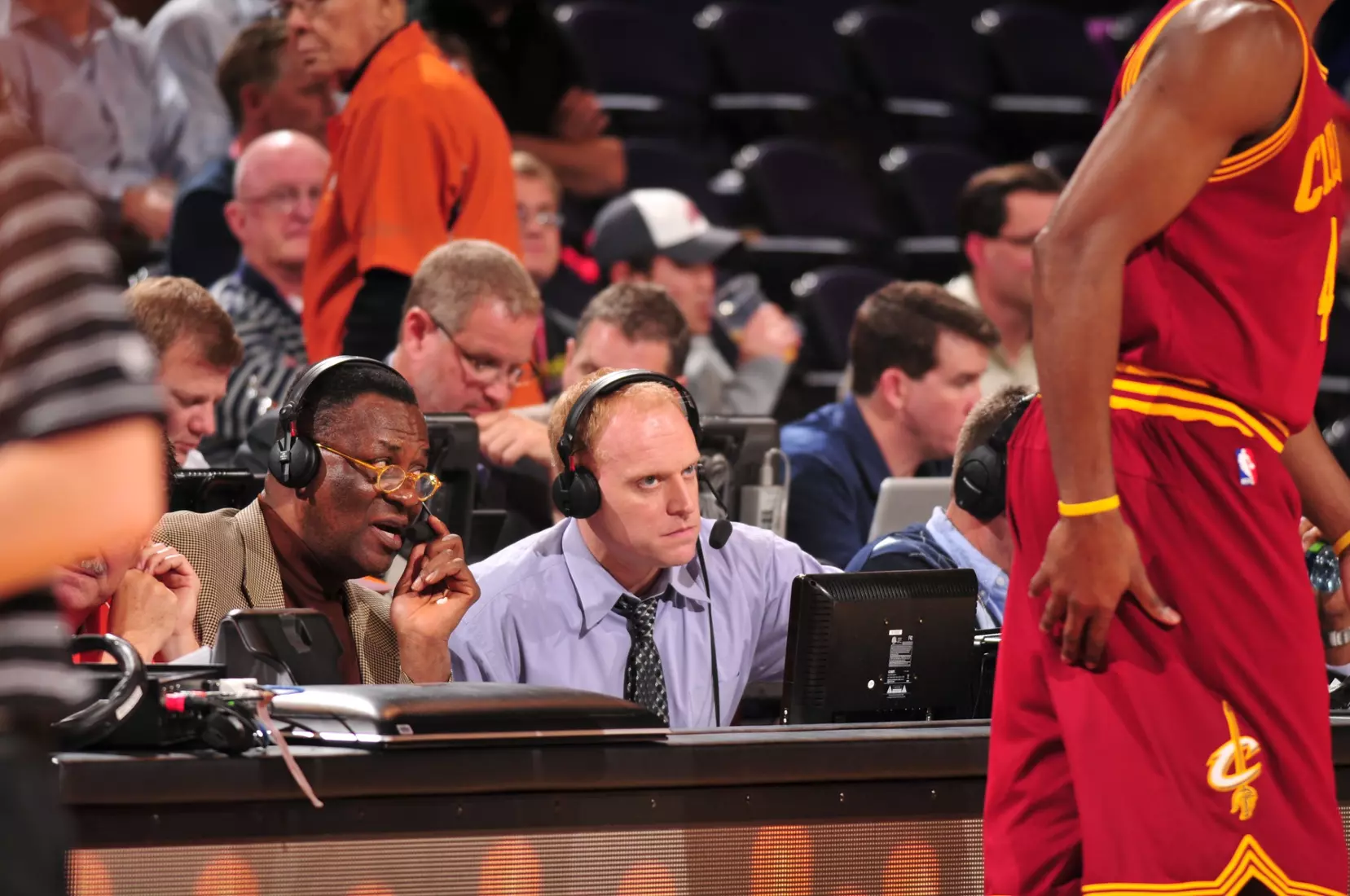 PHOENIX, AZ - JANUARY 12: Cleveland Cavaliers' announcers Jim Chones and John Michael discuss third quarter play as the Phoenix Suns host the Cavaliers in an NBA game played on January 12, 2012 at U.S. Airways Center in Phoenix, Arizona. NOTE TO USER: User expressly acknowledges and agrees that, by downloading and or using this Photograph, user is consenting to the terms and conditions of the Getty Images License Agreement. Mandatory Copyright Notice: Copyright 2012 NBAE (Photo by Barry Gossage/NBAE via Getty Images)
