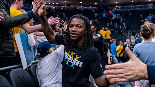 22 Sean Jones
#5 Marquette Men's Basketball defeats #11 Wisconsin 88-74  on Saturday December 7th, 2024 at Fiserv Forum In Milwaukee, WI