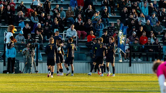 men's soccer celebration